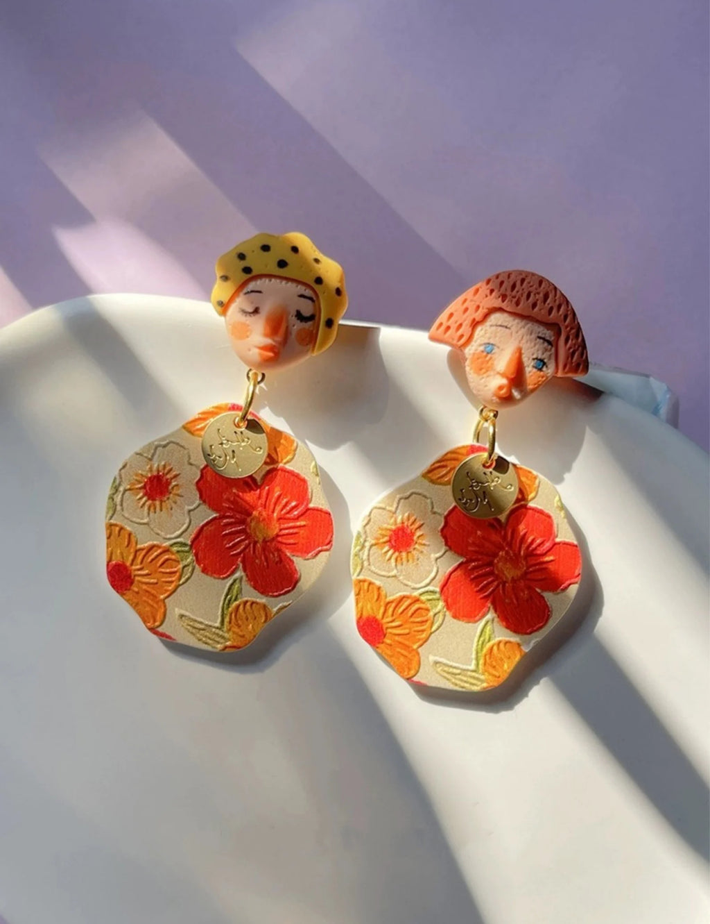 A Pair of Fashionable and Personalized Ethnic Style Indian Dolls With Colorful Polka Dot Cartoon Portraits Asymmetrical Earrings
